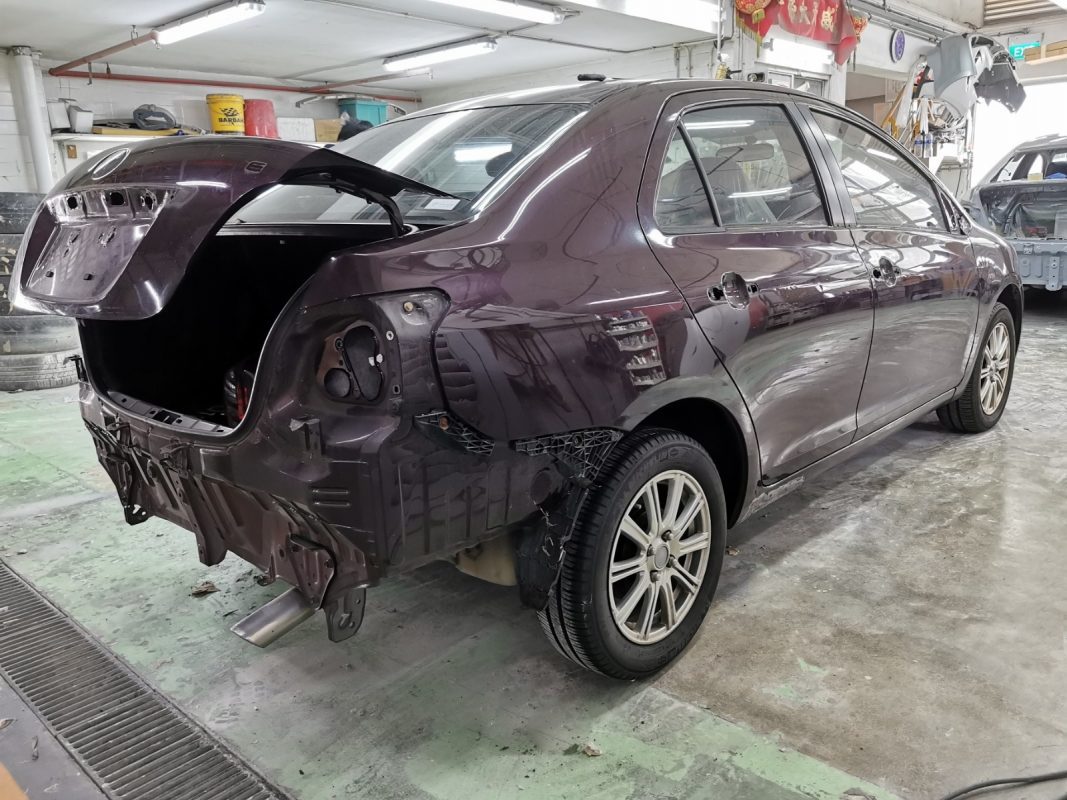 Car parts being dismantled from the Vios before spraying.