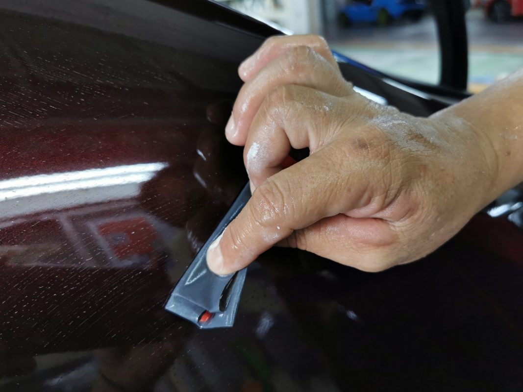 The Vios after spraying, being sanded back for an even surface.