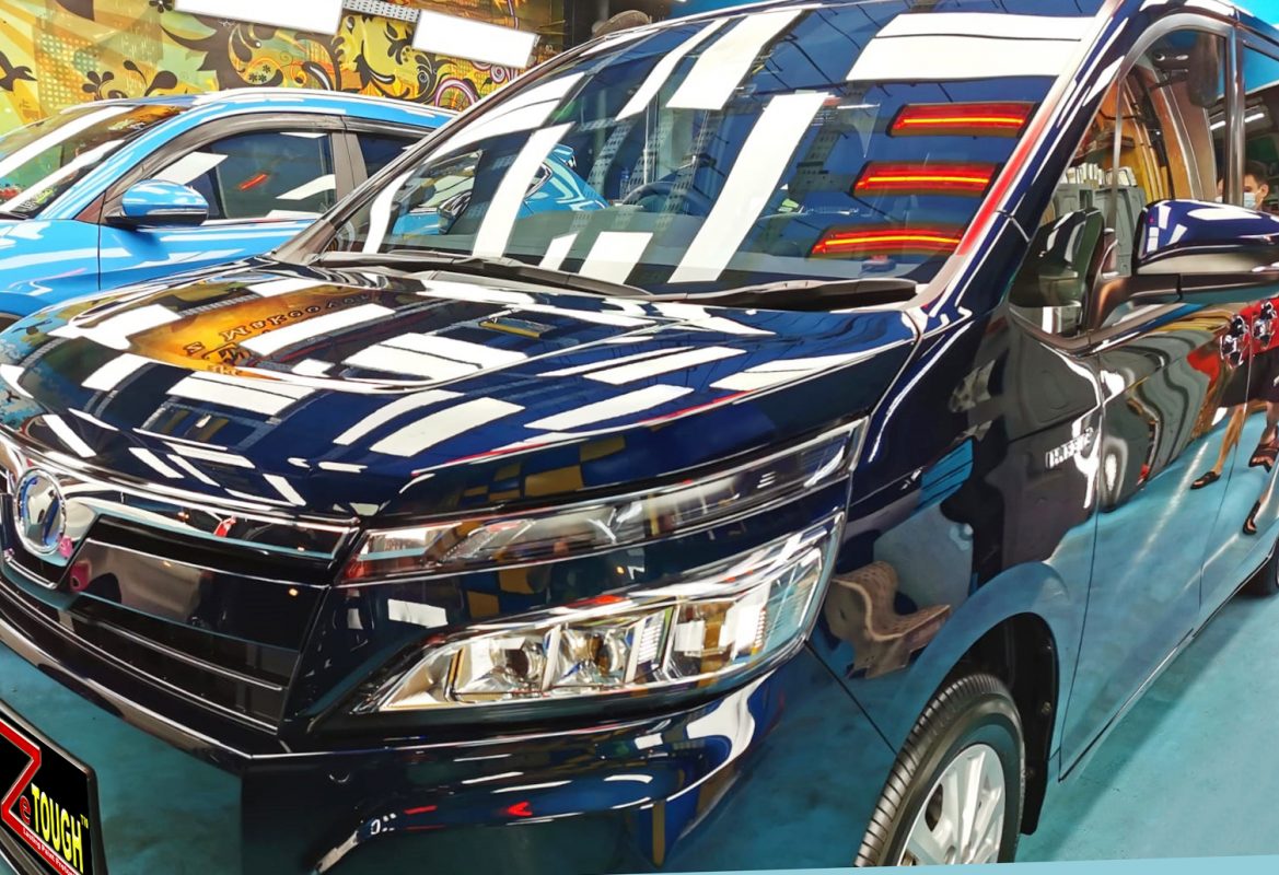 The Toyota Voxy from a side angle after the titanium coating.