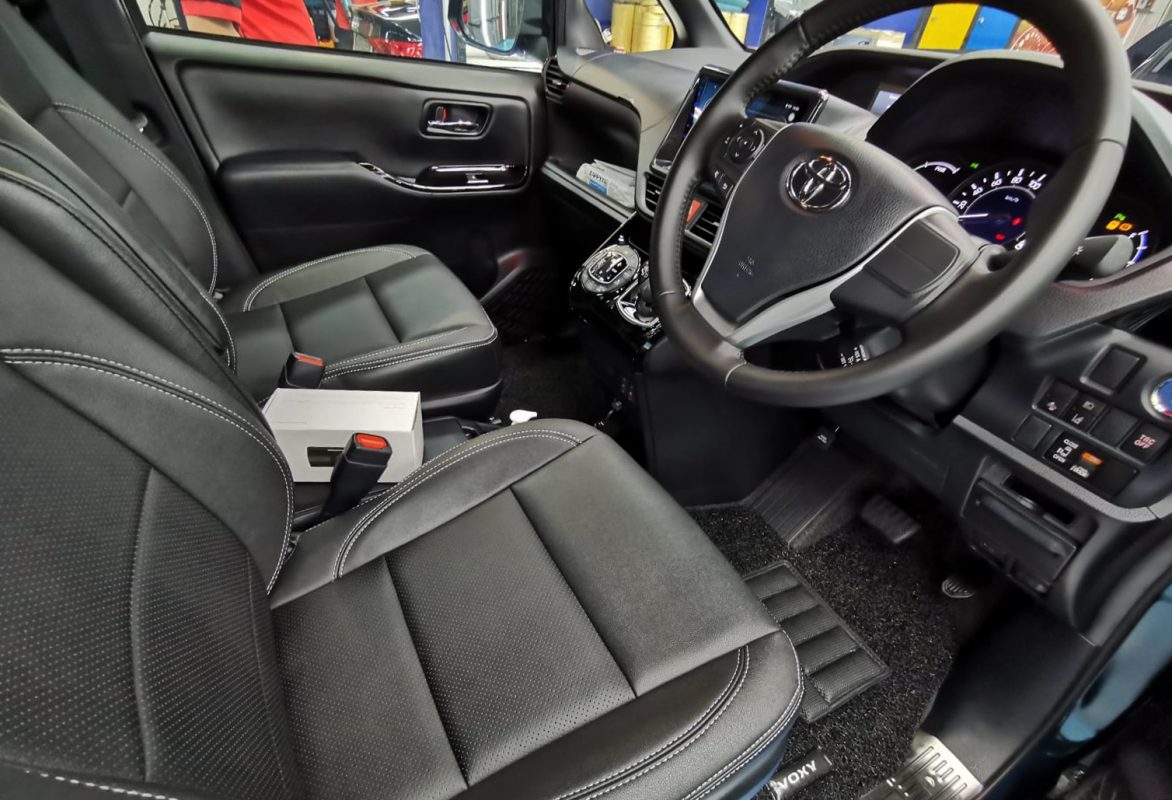 The Toyota Voxy parked in the workshop, freshly coated.