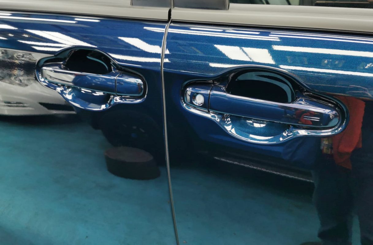 Front three-quarter view of the Toyota Voxy after coating.