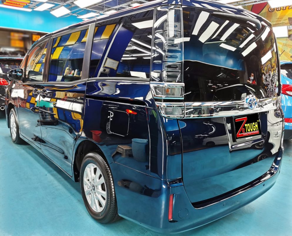 Rear quarter of the Toyota Voxy, glossy and protected.