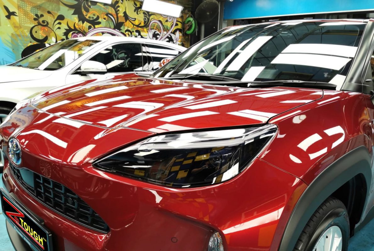 The Toyota Yaris from a side angle after the ceramic coating.