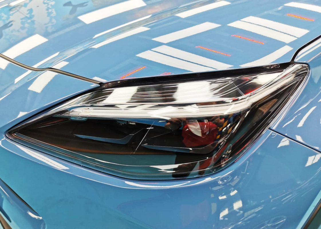 The Yaris Cross's coated paintwork showing clean reflections.