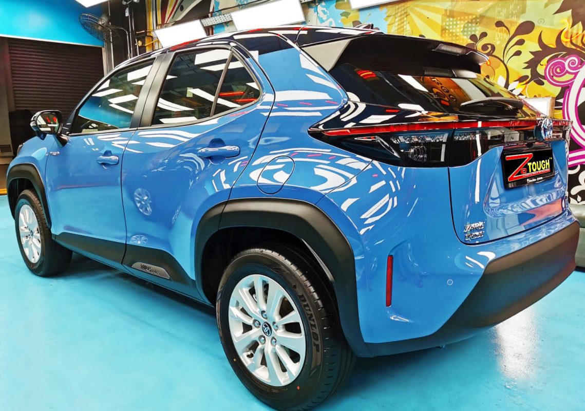 Rear quarter of the Yaris Cross, glossy and protected.