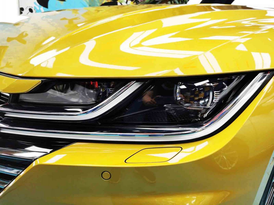 The Arteon's coated paintwork showing clean reflections.