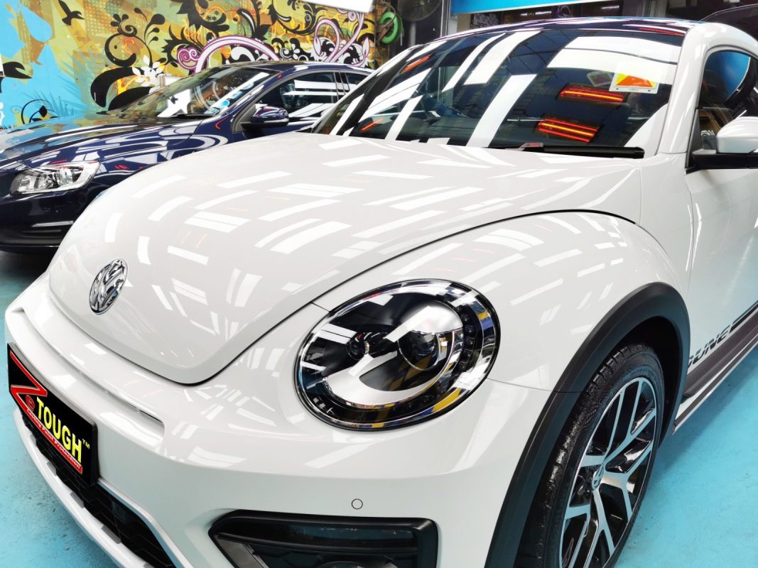 The Volkswagen Beetle Dune from a side angle after the ceramic coating.