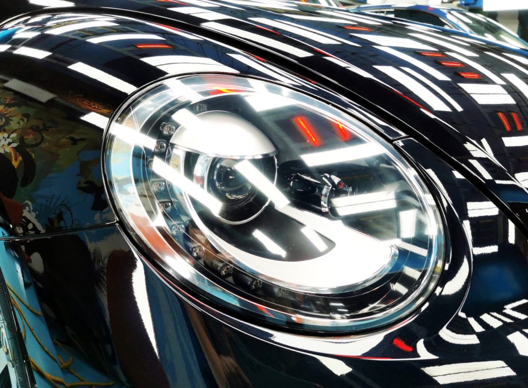 The Beetle's coated paintwork showing clean reflections.
