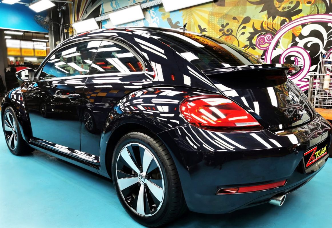 Rear quarter of the Beetle, glossy and protected.