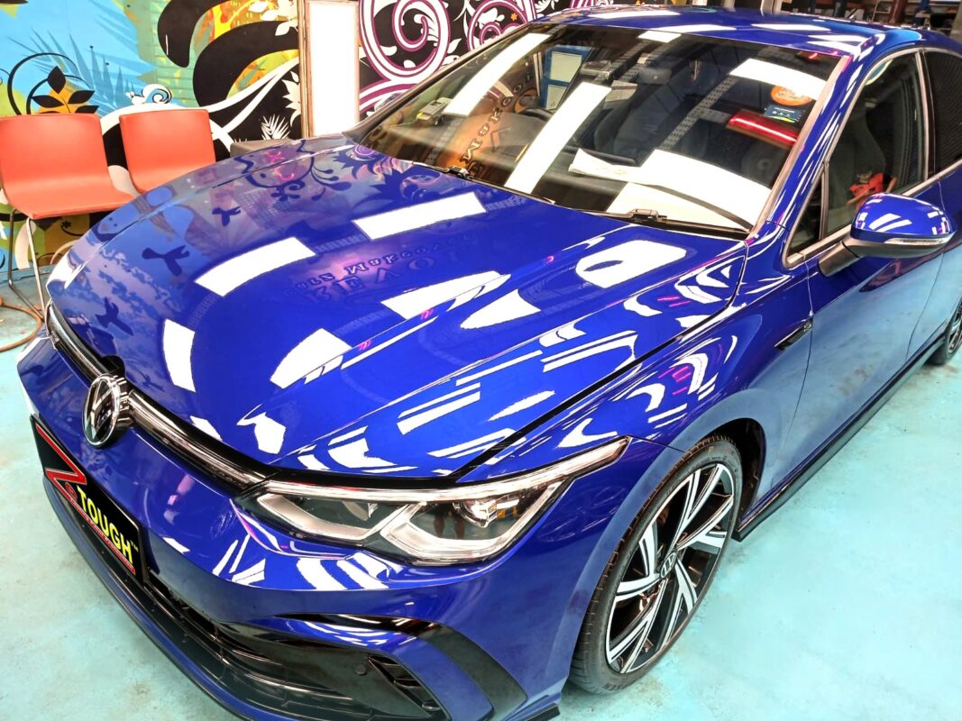 The Volkswagen Golf from a side angle after the ceramic coating.