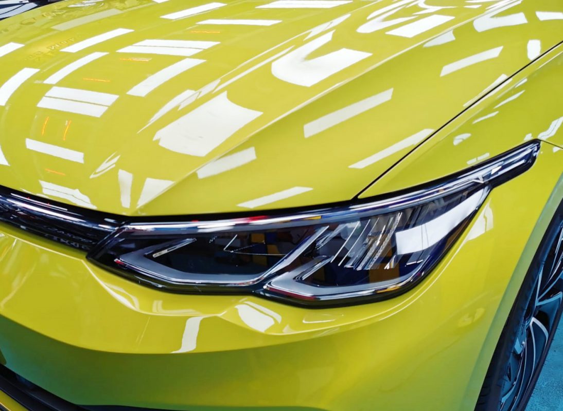The Golf's coated paintwork showing clean reflections.