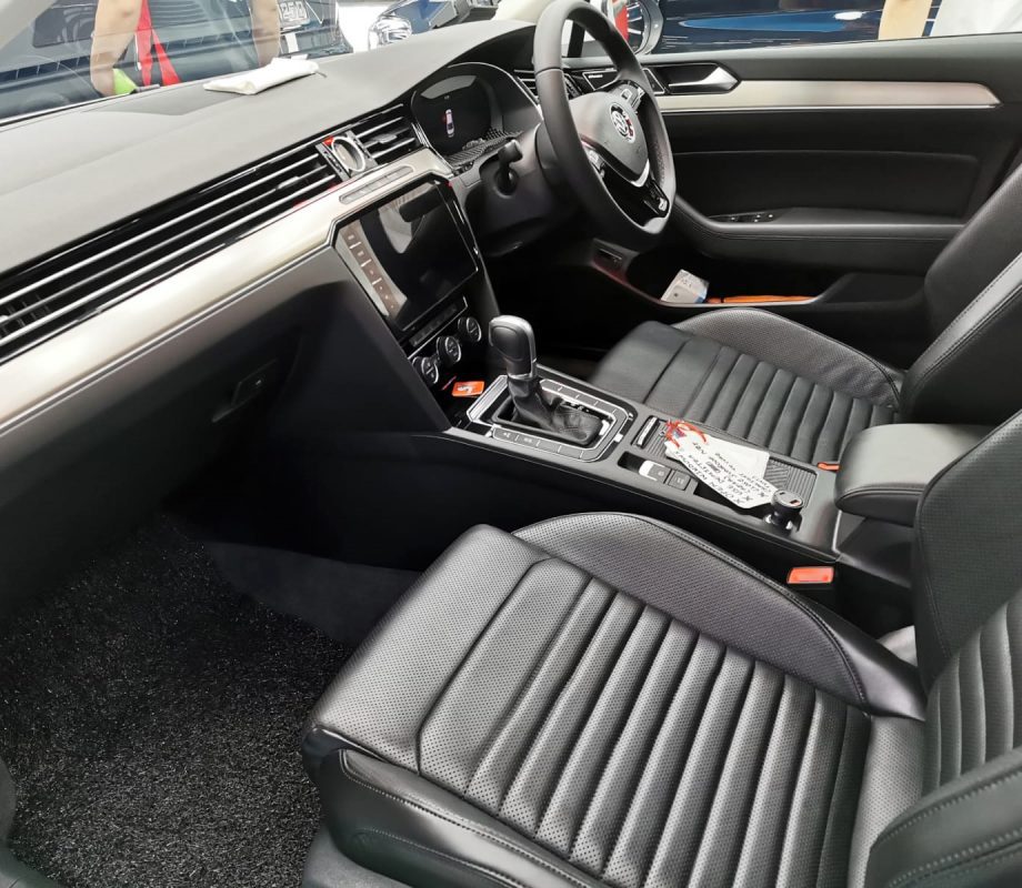 The Volkswagen Passat parked in the workshop, freshly coated.