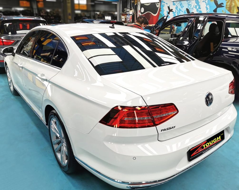 Rear quarter of the Volkswagen Passat, glossy and protected.