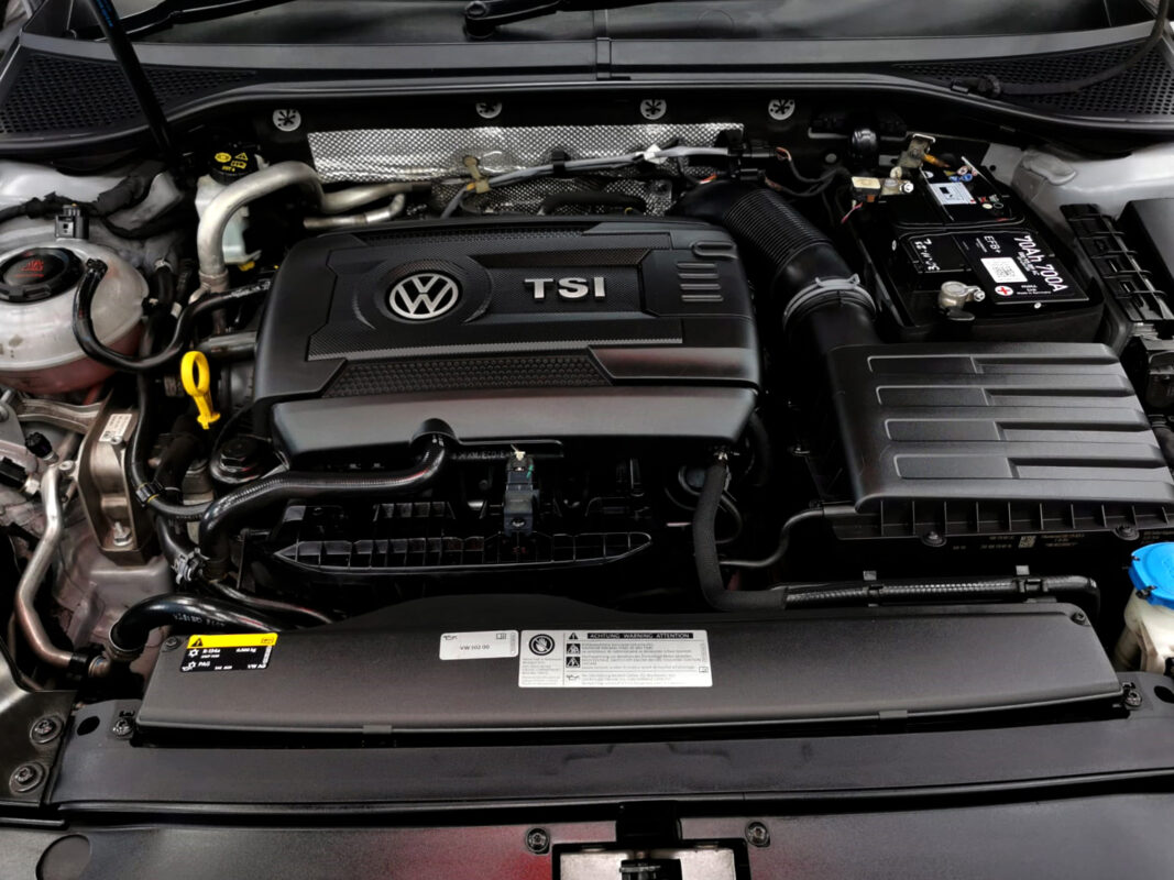 The Volkswagen Passat parked at AMK AutoPoint, freshly coated.