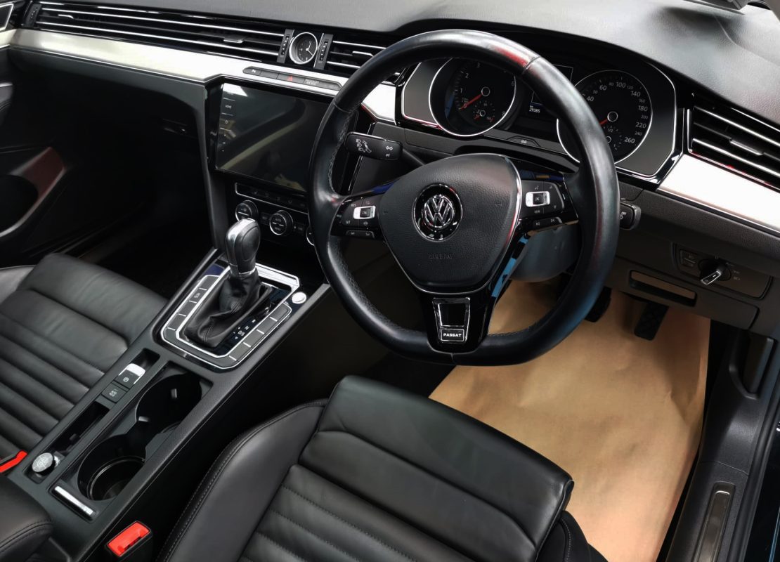 The Volkswagen Passat parked in the workshop, freshly coated.