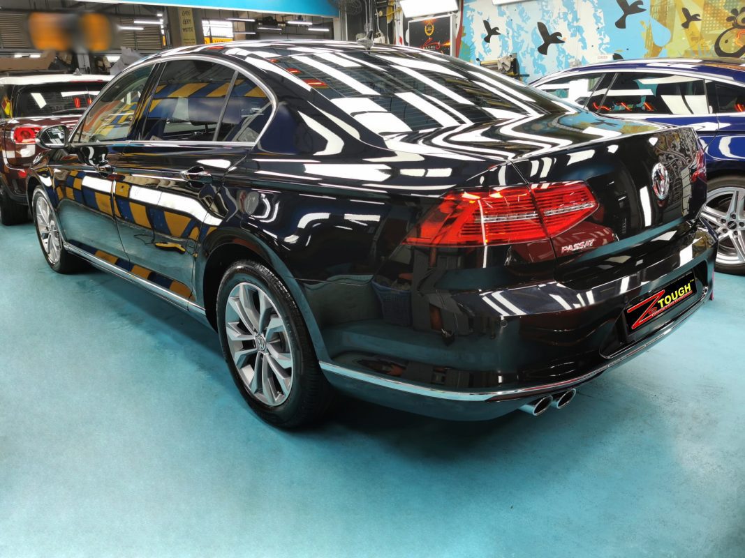 Rear quarter of the Passat, glossy and protected.