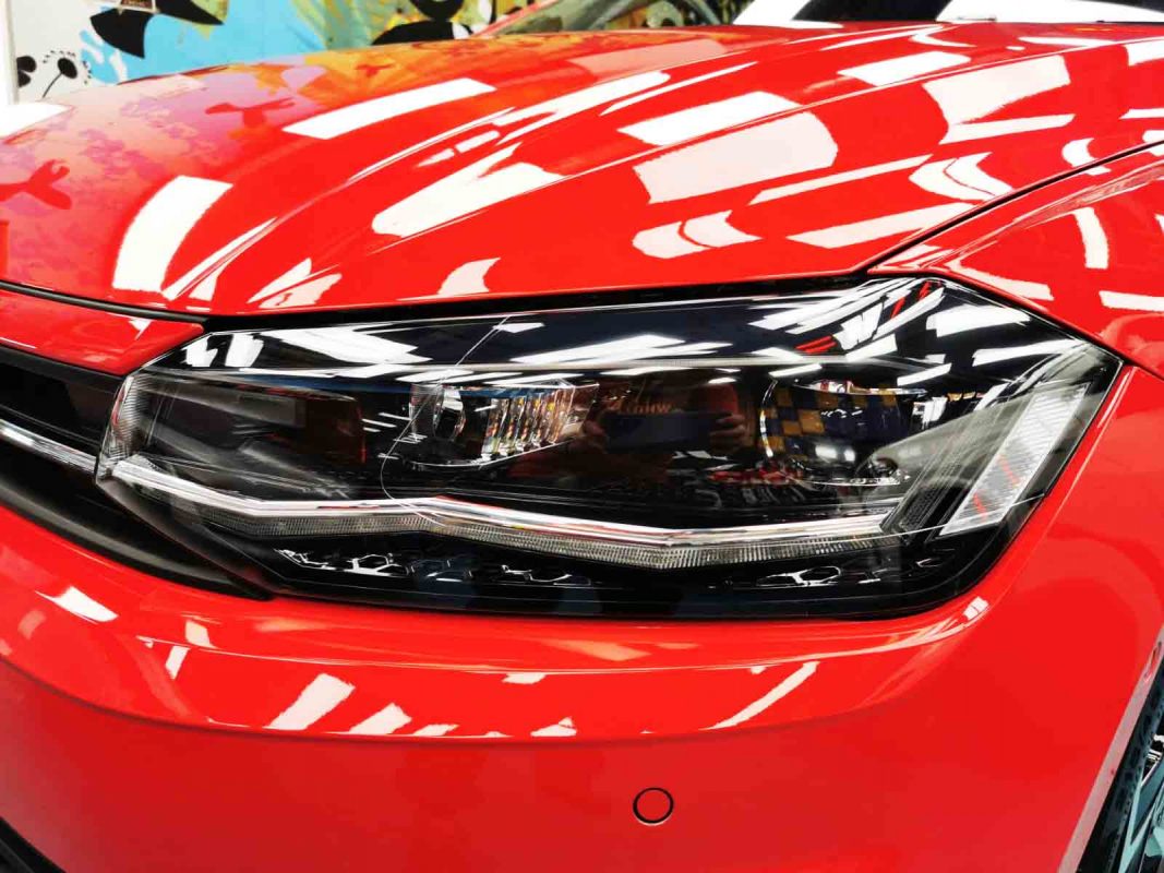 The Polo's coated paintwork showing clean reflections.
