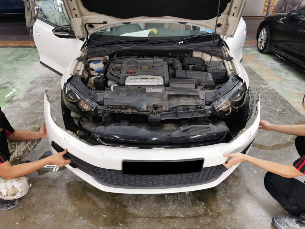The Volkswagen Scirocco with parts removed, ready for surface preparation.