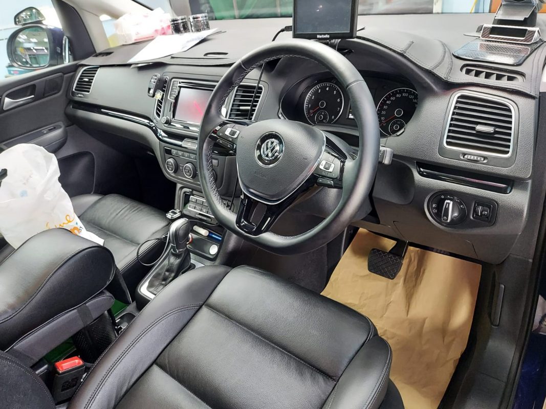 The Volkswagen Sharan parked in the workshop, freshly coated.