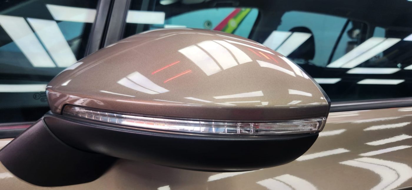 The Volkswagen Sportsvan parked in the workshop, freshly coated.