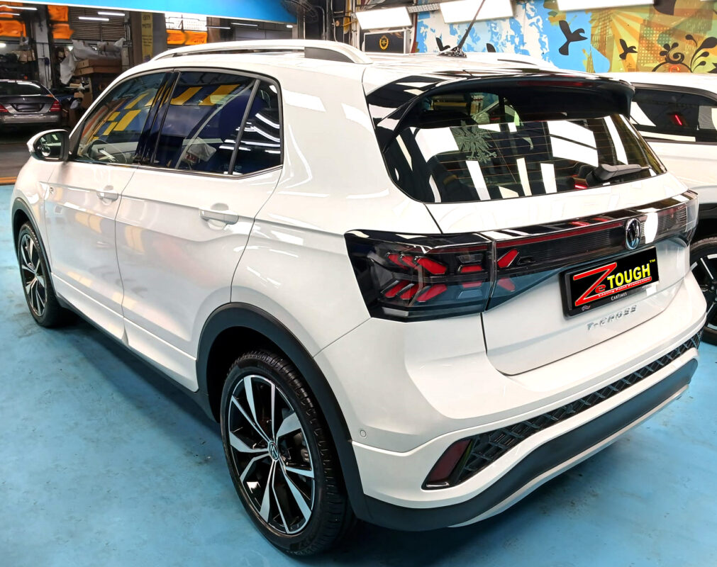 Rear quarter of the Volkswagen T-Cross, glossy and protected.