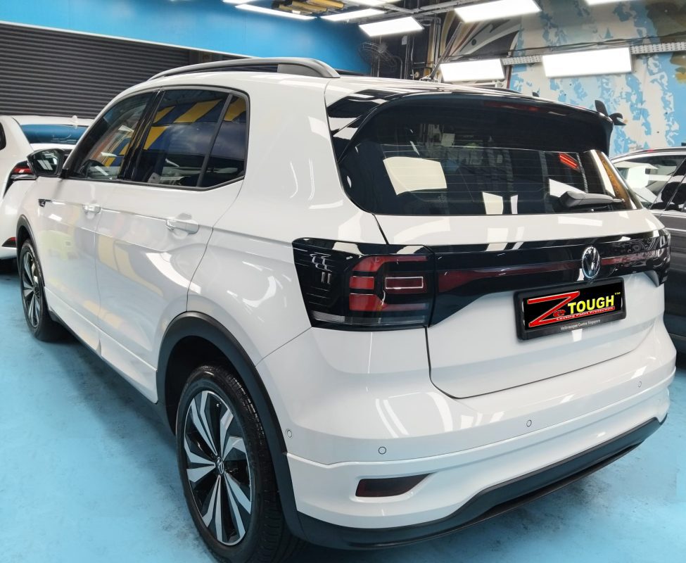 Rear quarter of the Volkswagen T-Cross, glossy and protected.