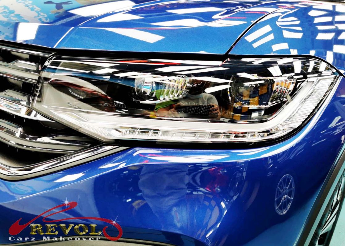 The T-Cross's coated paintwork showing clean reflections.