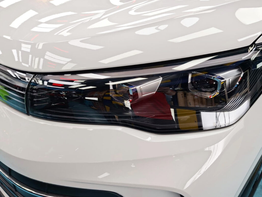 The Tiguan's coated paintwork showing clean reflections.