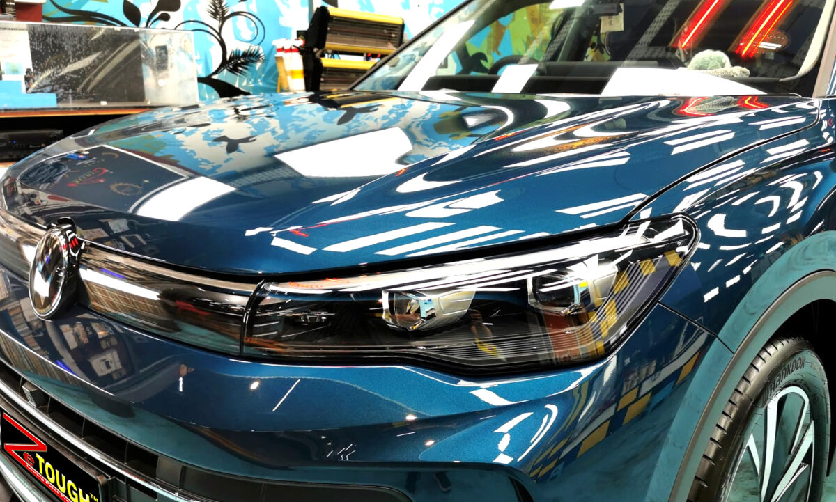 The Volkswagen Tiguan from a side angle after the ceramic coating.