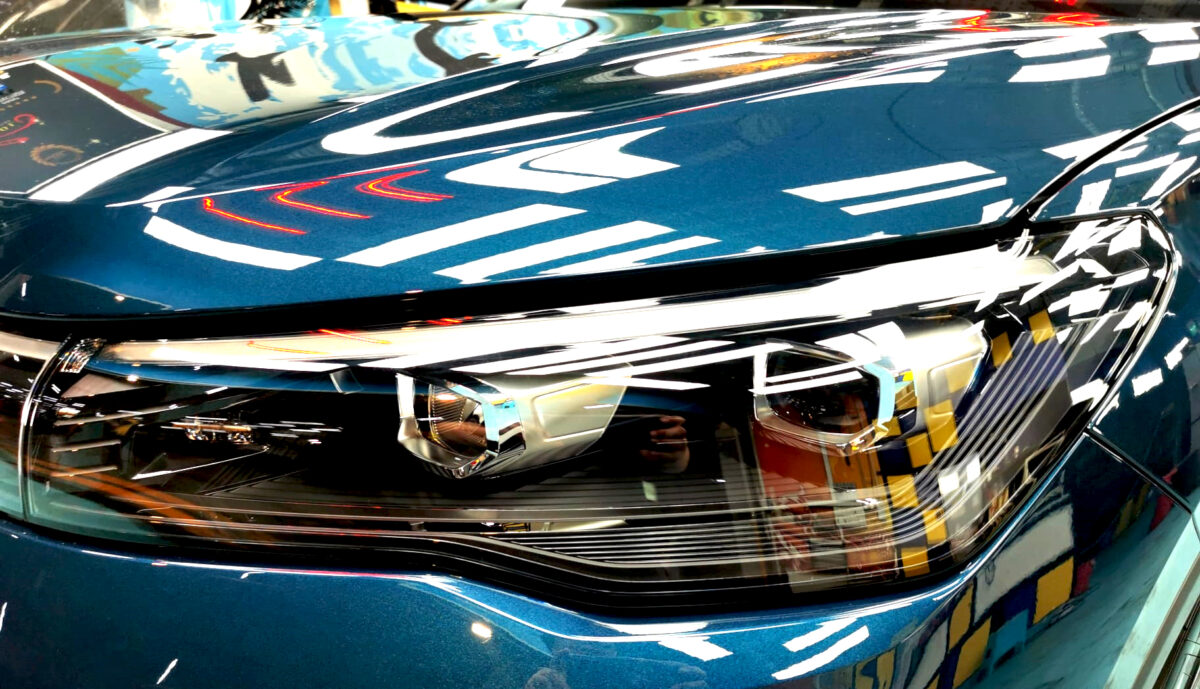 The Tiguan's coated paintwork showing clean reflections.