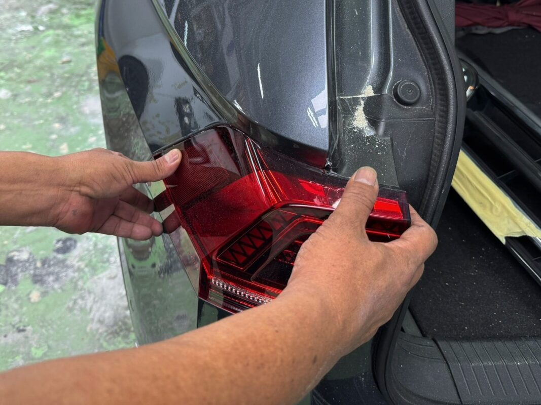 Machine polishing the Tiguan to bring up the gloss after the respray.