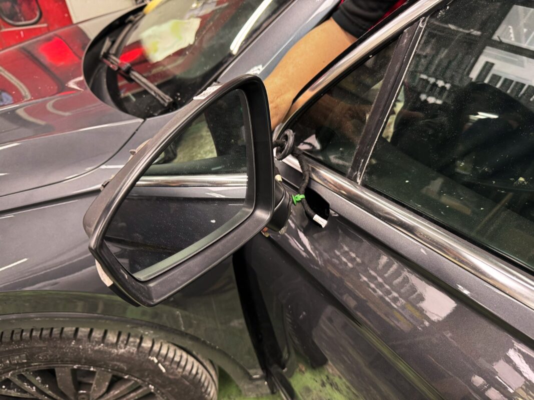 The Volkswagen Tiguan being reassembled after the respray and polish are complete.