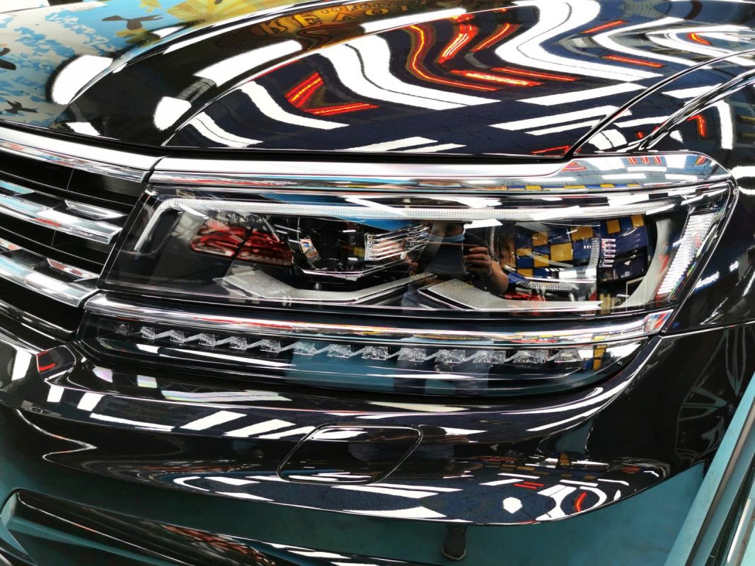 The Tiguan's coated paintwork showing clean reflections.