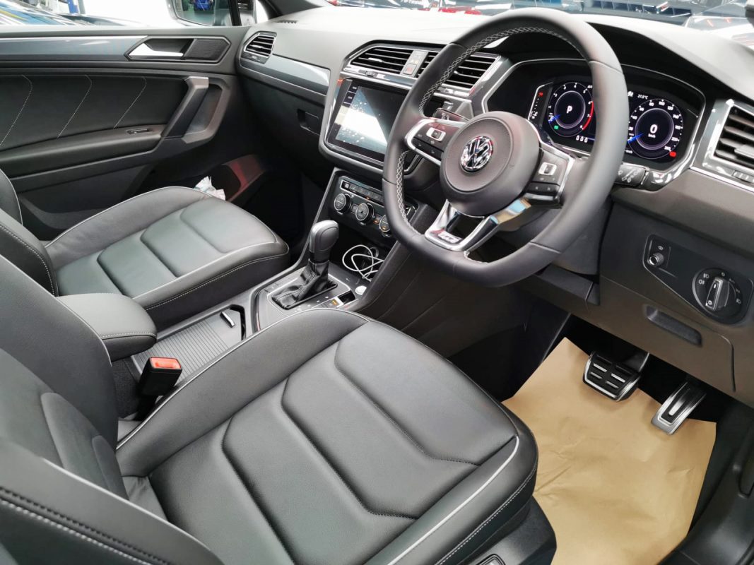 The Volkswagen Tiguan parked in the workshop, freshly coated.