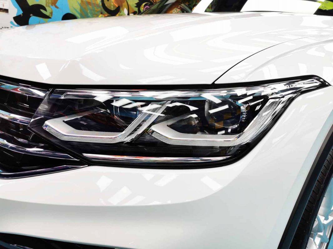 The Tiguan's coated paintwork showing clean reflections.
