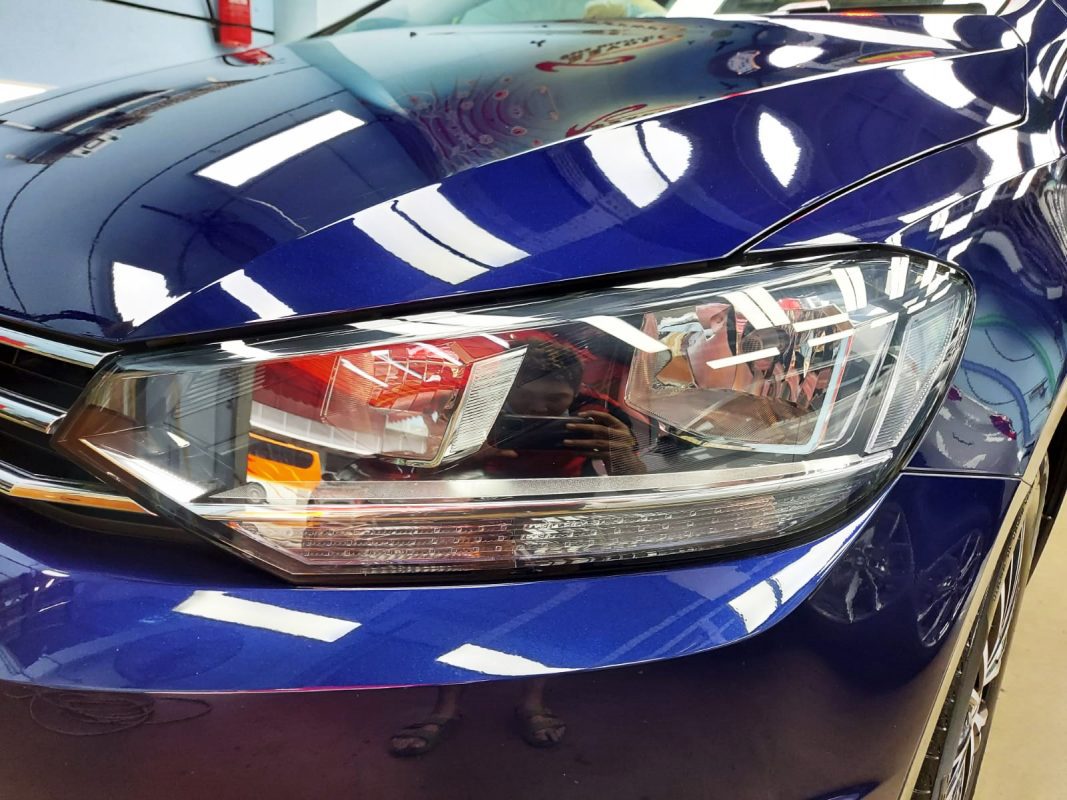 The Touran's coated paintwork showing clean reflections.