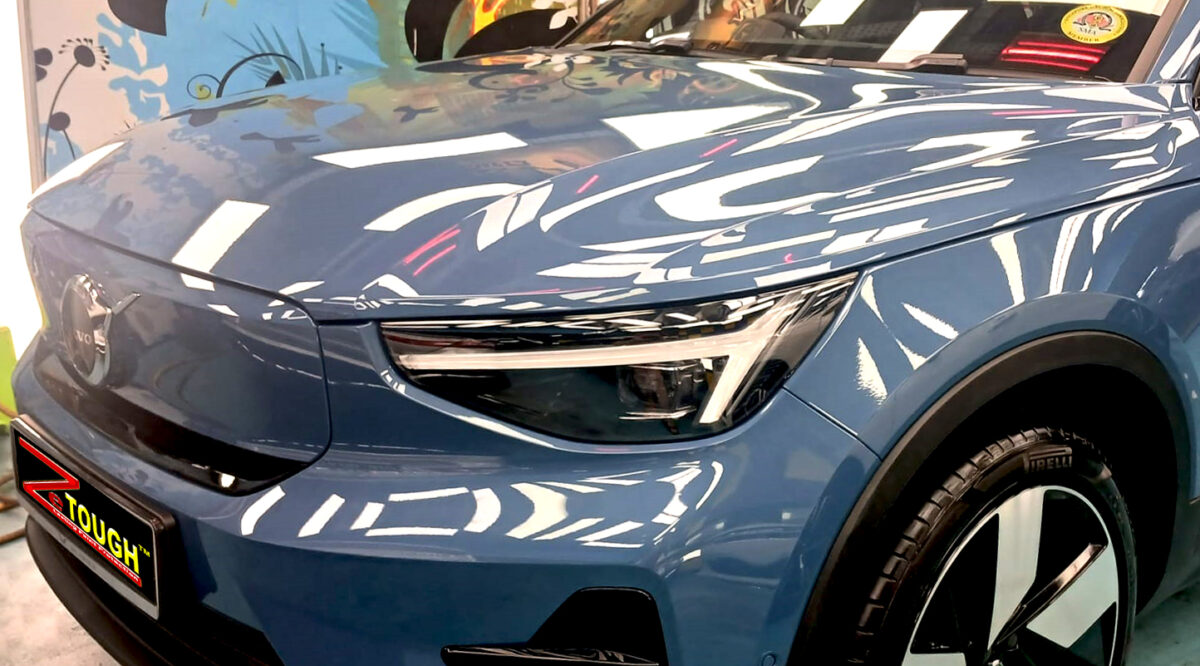The Volvo C40 from a side angle after the ceramic coating.