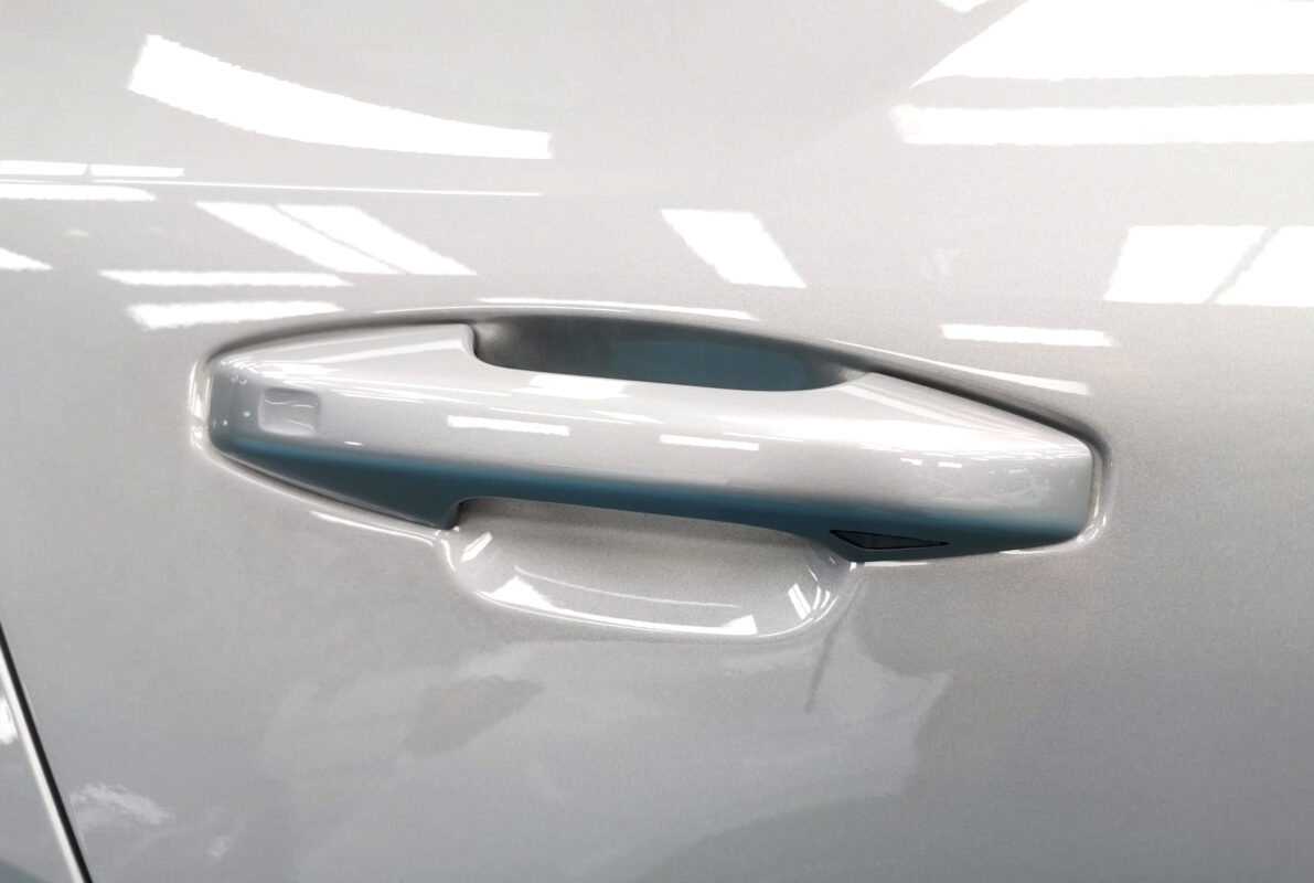 Front three-quarter view of the Volvo EX40 after coating.