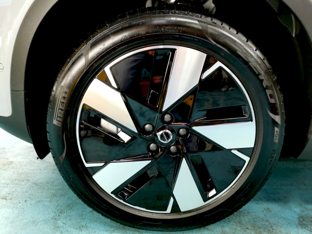 Rear quarter of the Volvo EX40, glossy and protected.