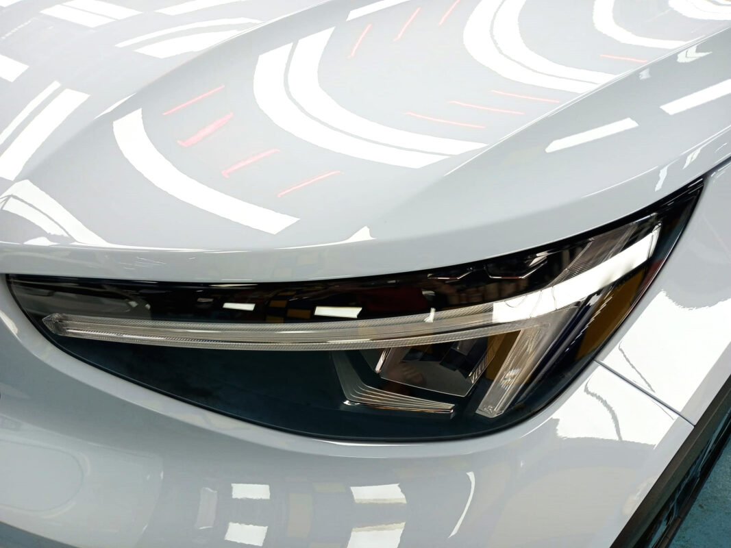 Side angle of the Volvo EX40Plus after the ceramic coating.