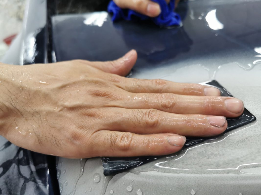 Wet-sanding the whole surface of the S60 for an even finish.