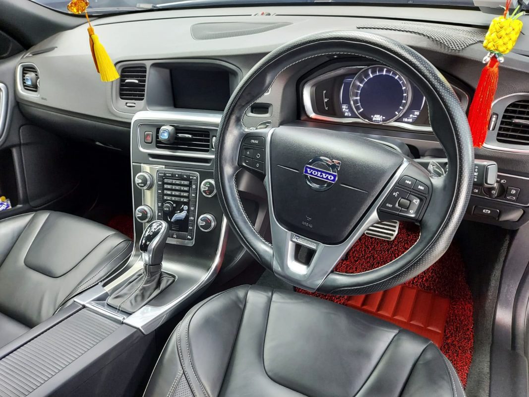 The Volvo S60 parked in the workshop, freshly coated.