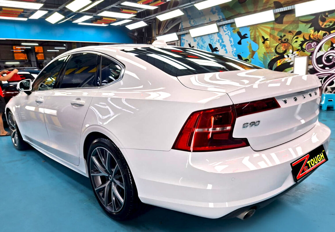 The coated paintwork of the Volvo S90, clean and sharp.