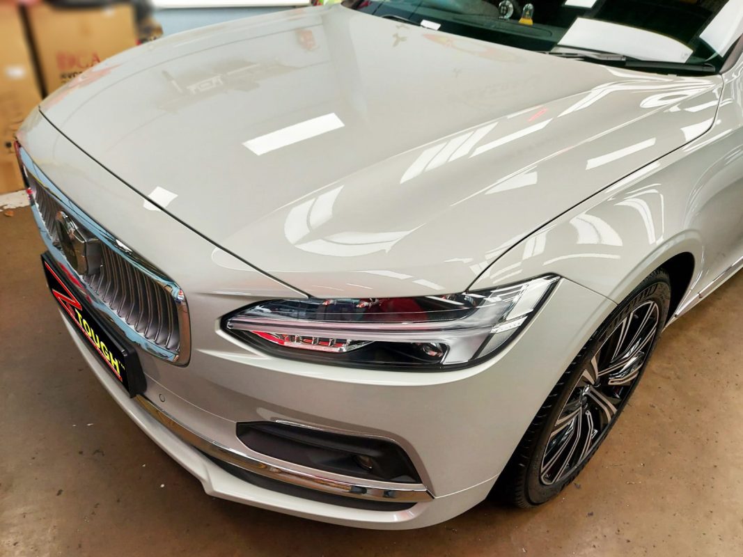 The Volvo S90 from a side angle after the titanium coating.