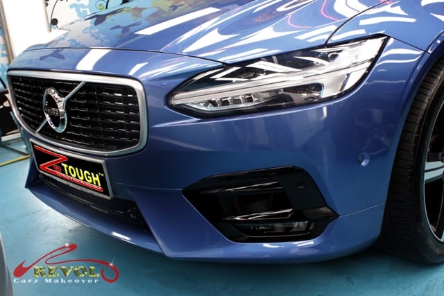 The Volvo V90 from a side angle after the ceramic coating.