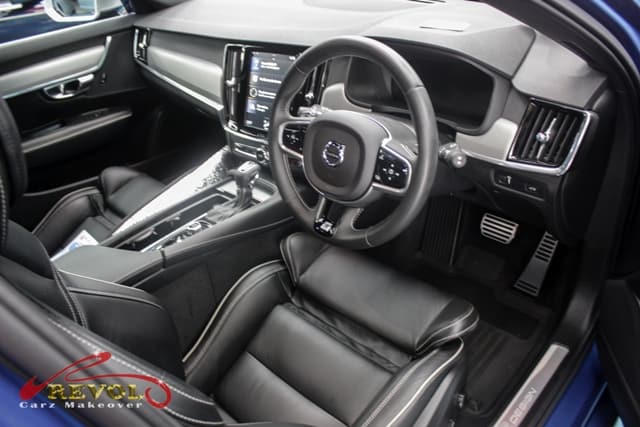 The Volvo V90 parked in the workshop, freshly coated.