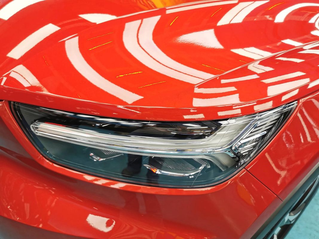 The XC40's coated paintwork showing clean reflections.