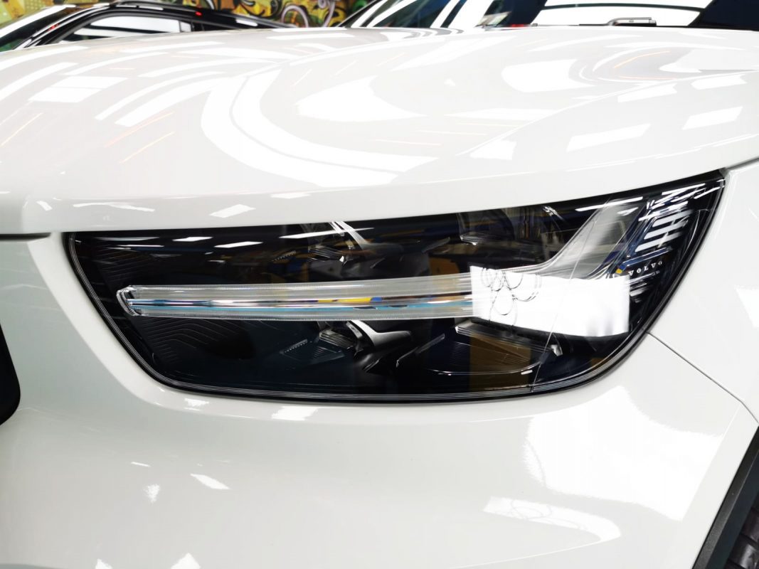 The XC40's coated paintwork showing clean reflections.