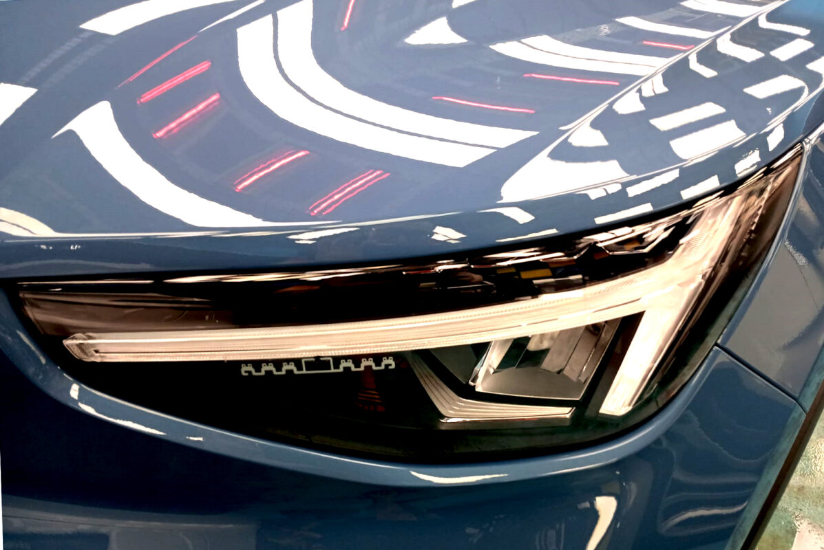 The XC40's coated paintwork showing clean reflections.