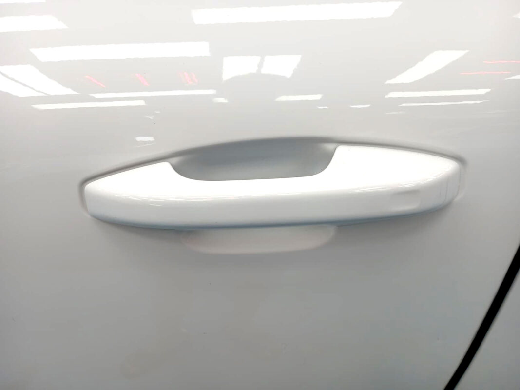 Rear quarter of the Volvo XC40, glossy and protected.